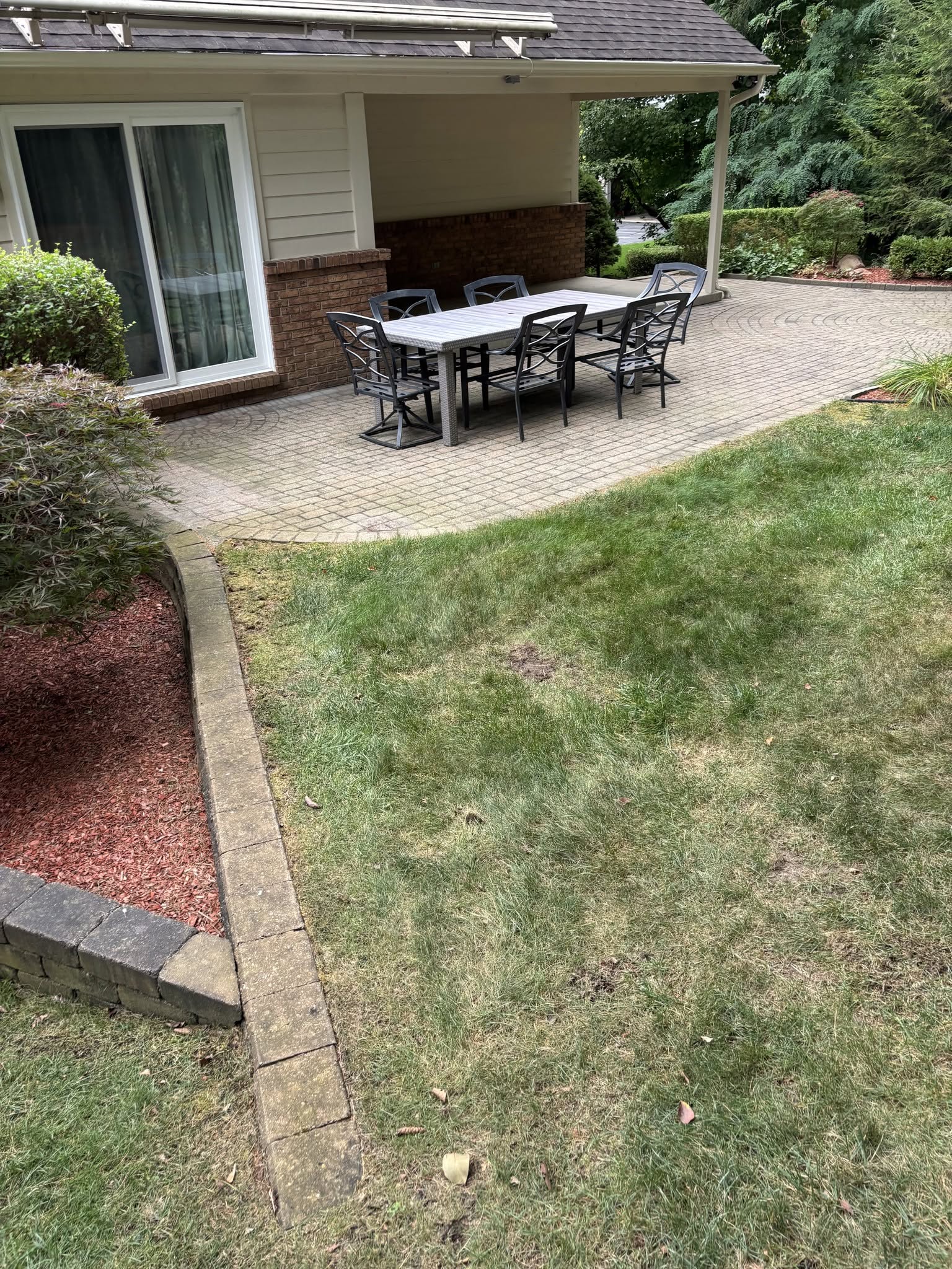 Stone patio hardscape and outdoor living space by Construction company Fenton, MI Stone patio hardscape and outdoor living space by Construction company Fenton, MI
